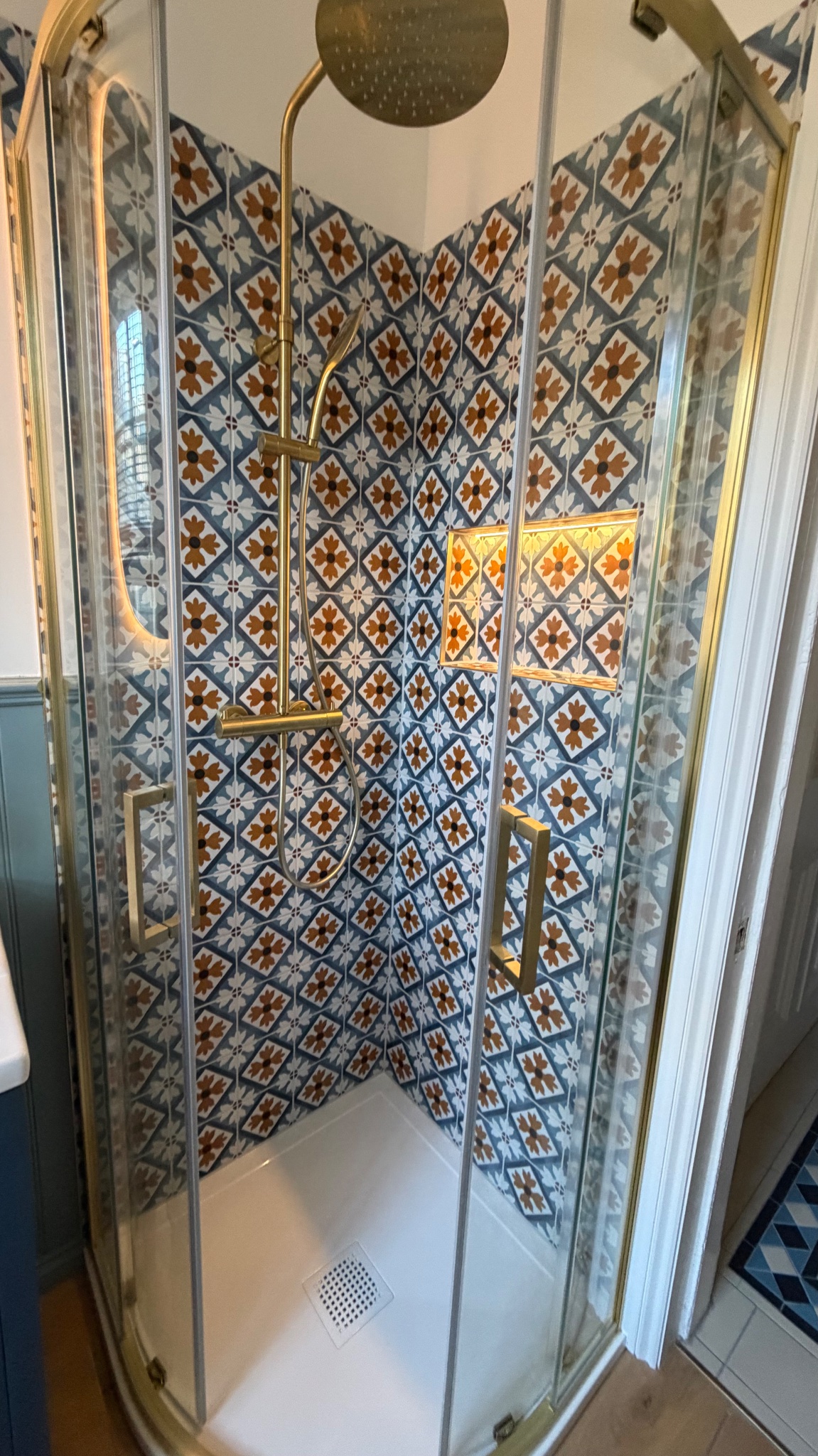 Patterned Tile Shower — Brass Fixtures